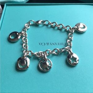TIFFANY & CO. STERLING SILVER FIVE CHARM BRACELET